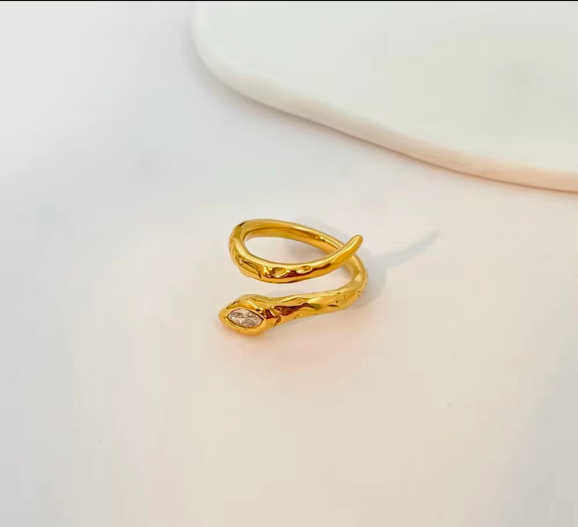 The Serpentine Glow Ring