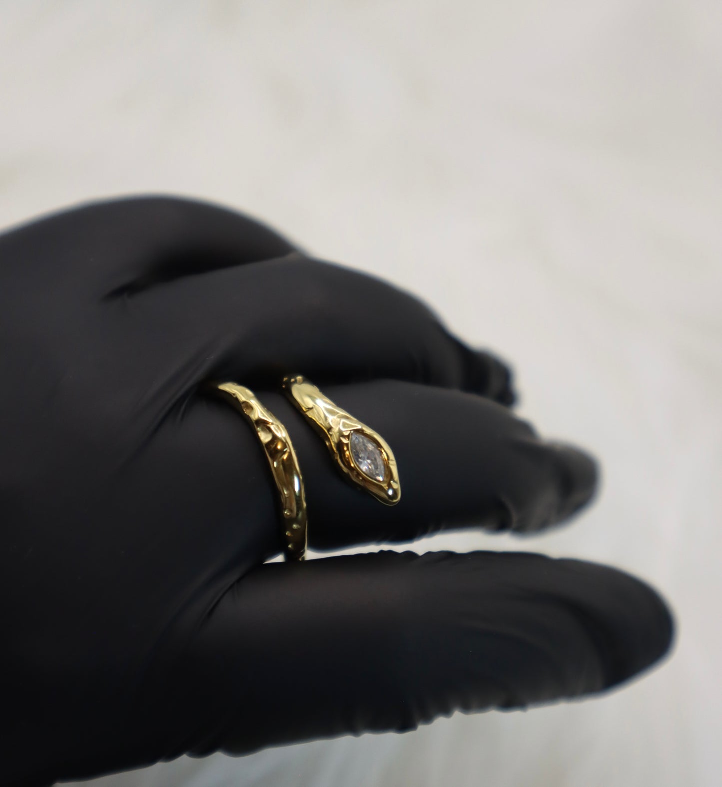 The Serpentine Glow Ring