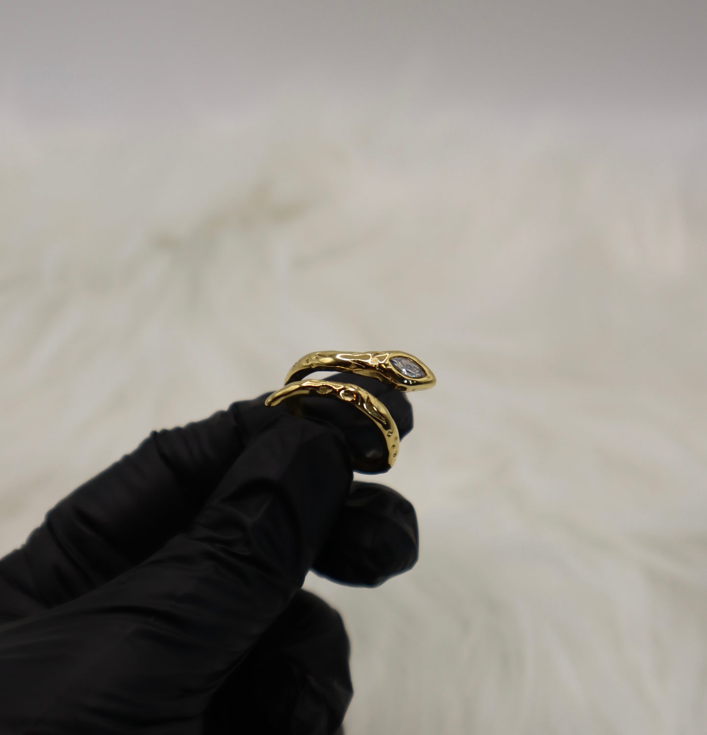 The Serpentine Glow Ring